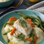 Fischragout mit grünen Bohnen in cremiger Senfsoße